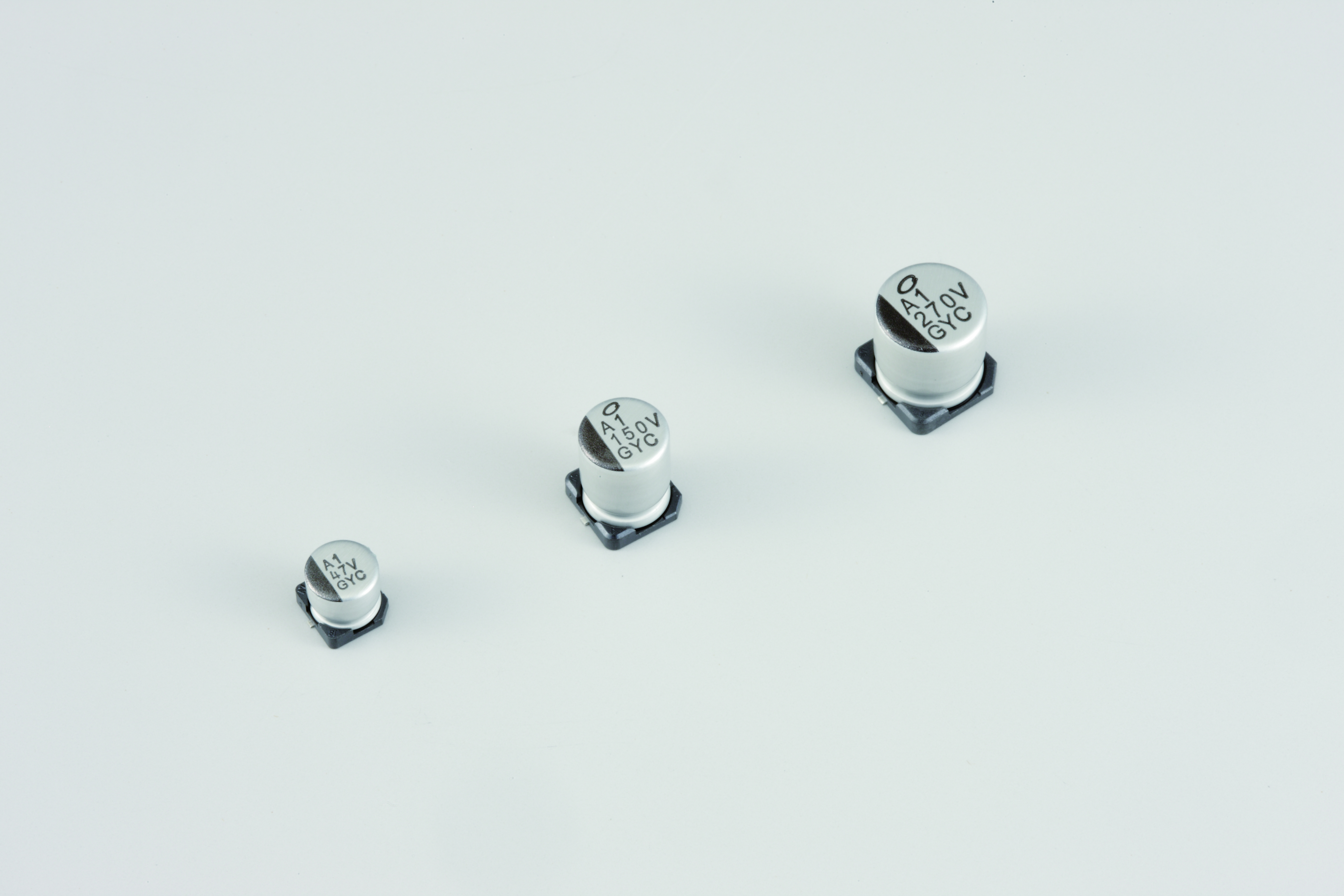 Nichicon 56μF Conductive Polymer Hybrid Aluminium Electrolytic Capacitor 63V dc, Surface Mount - GYC1J560MCQ1GS