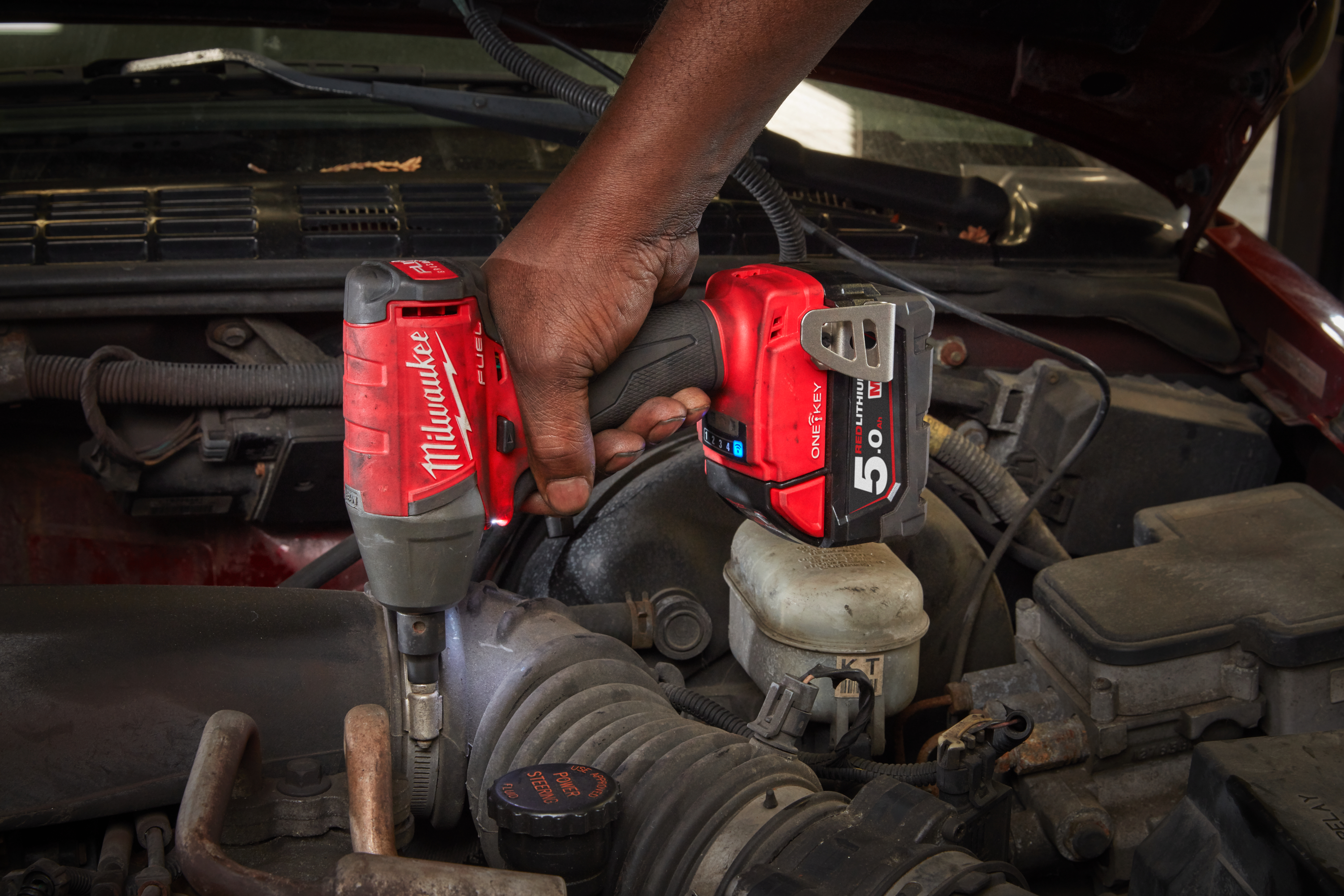 m18oneiwf38-502x Milwaukee 3/8 in 18V, 5Ah Cordless Impact Driver Cordless